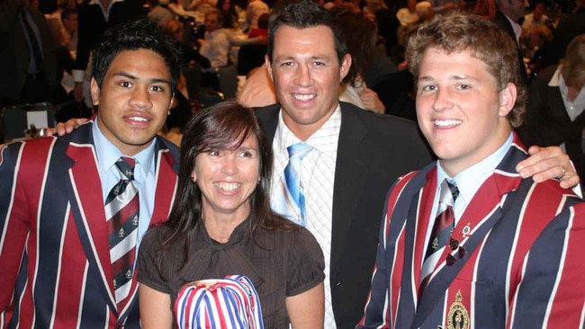 Coach Matt Taylor with TSS 2007 First XV stars Ben Tapuai and James Slipper, with Lisa Patterson. Picture: Supplied