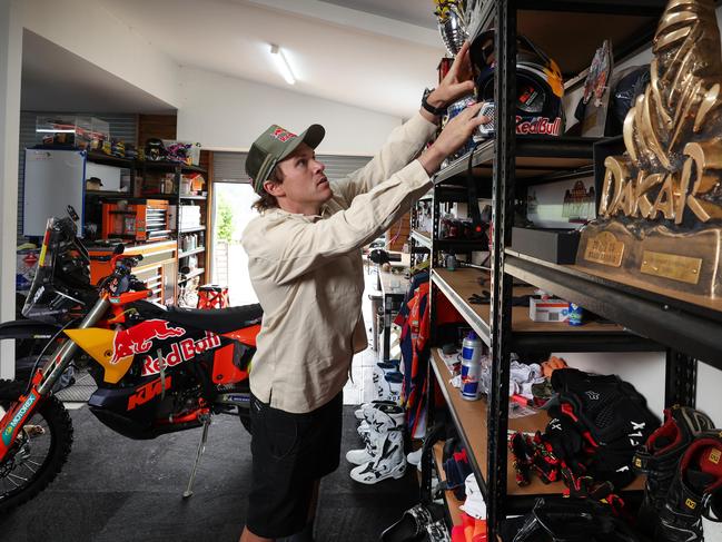 Sanders relaxes in his ‘man cave’ shed, adorned with trophies, bikes and various parts. Picture: David Caird