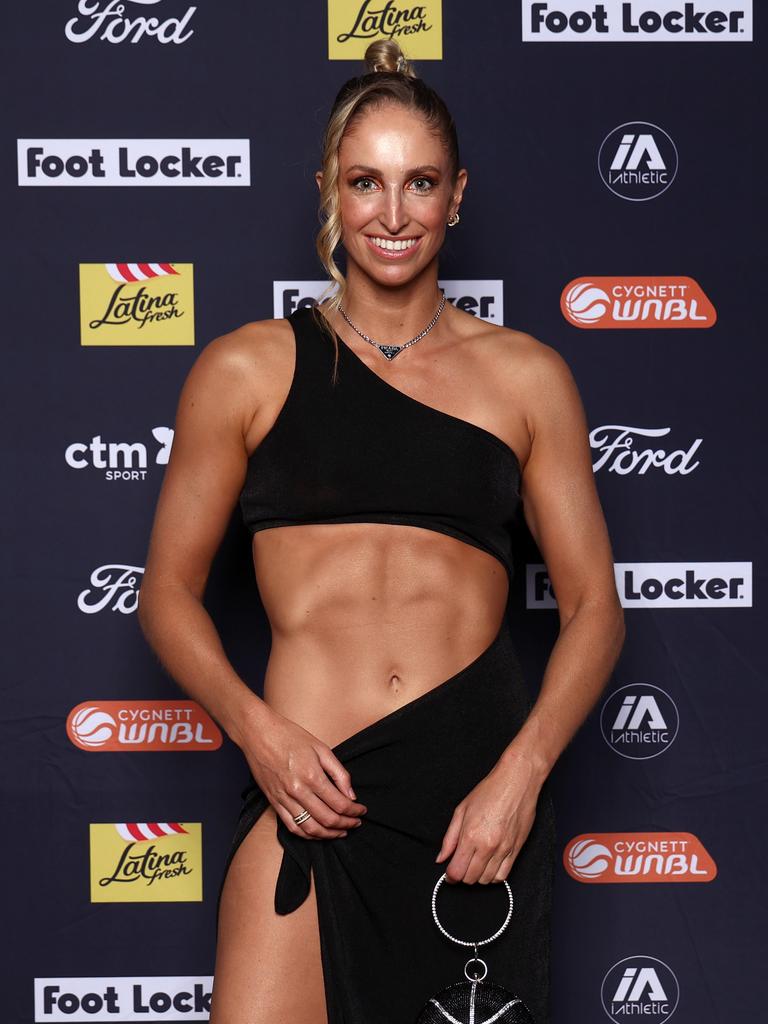 The 32-year-old Cole showed off her ripped physique with a one-shoulder crop top dress that led into a skirt with a slip that went all the way up. Photo by Graham Denholm/Getty Images for WNBL