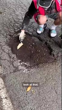 Fed-up landscaper fills pothole-riddled roads with flowers