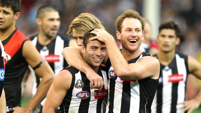 Jarryd Blair enjoys Collingwood’s win with teammate Ben Johnson.