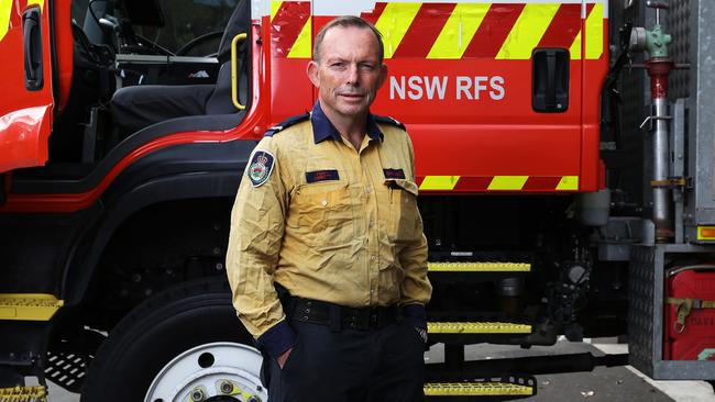 Former prime minister Tony Abbott in his NSW Rural Fire Service uniform on Sunday. Picture: Jane Dempster