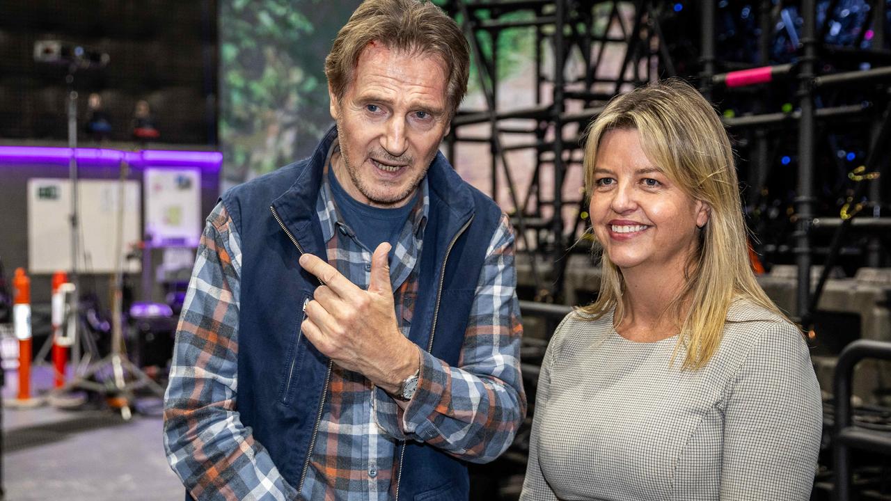 Liam Neeson speaking to with VicScreen chief executive Caroline Pitcher on the set of Ice Road 2: Road to the Sky, which he also filmed in Victoria, with the shoot wrapping in 2024. Picture: Jake Nowakowski.