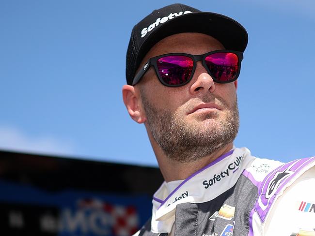 DAYTONA BEACH, FLORIDA - AUGUST 23: Shane van Gisbergen, driver of the #97 Safety Culture Chevrolet, looks on during qualifying for the NASCAR Xfinity Series Wawa 250 Powered by Coca-Cola at Daytona International Speedway on August 23, 2024 in Daytona Beach, Florida. (Photo by James Gilbert/Getty Images)