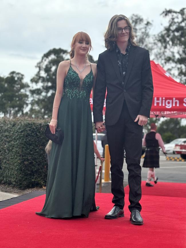 Students from Urangan State High School arrive at their formal.