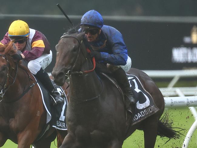 SYDNEY, AUSTRALIA - APRIL 20: James Mcdonald riding Broadsiding wins Race 7 Moet & Chandon Champagne Stakes during Sydney Racing at Royal Randwick Racecourse on April 20, 2024 in Sydney, Australia. (Photo by Jeremy Ng/Getty Images)