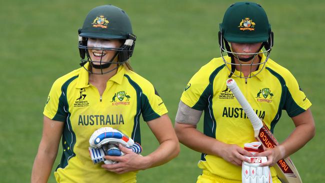 BRISTOL, ENGLAND — JULY 12: Australia batsmen Ellyse Perry (l) and Meg Lanning share a joke as they leave the field after the ICC Women's World Cup 2017 match between Australia and India at The County Ground on July 12, 2017 in Bristol, England. (Photo by Stu Forster/Getty Images)