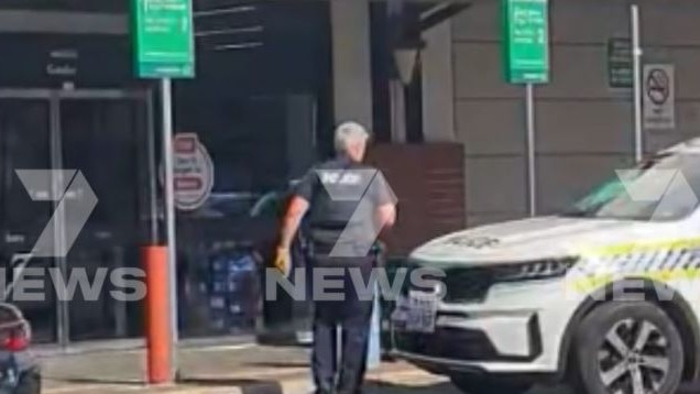 A 50-year-old man has been arrested after he was spotted with a knife inside a Gawler supermarket. Staff and customers fled as police swooped and took the man into custody. Picture: 7NEWS