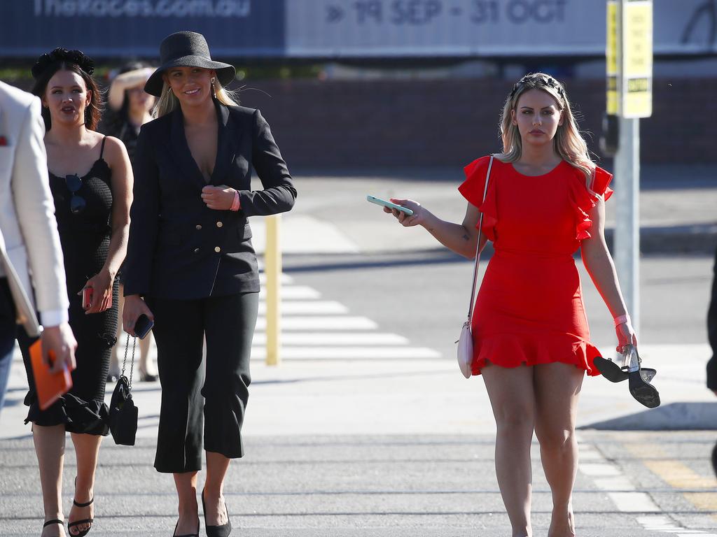 Racegoers leave Royal Randwick after the Melbourne Cup race meet.