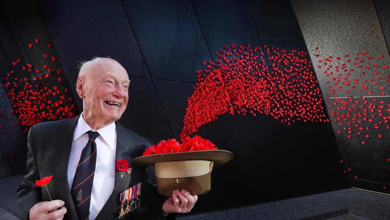99-year-old WWII POW Jack Bell at The Shrine of Remembrance in Victoria, with the wall of poppies for Remembrance Day. Picture: Alex Coppel.