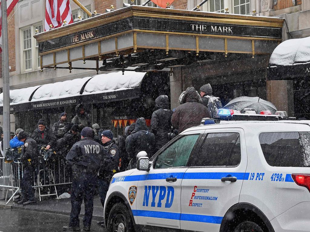 New York police officers and members of the press stand outside The Mark Hotel during Meghan, Duchess of Sussex's baby shower. Picture: AFP