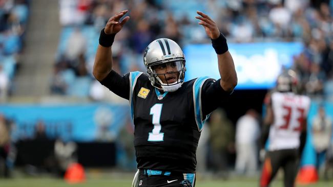 Cam Newton fires up his Carolina Panthers fans after their high-scoring victory. Picture: Getty