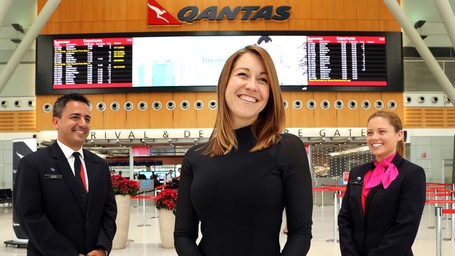 03/12/2015: Olivia Wirth; Head of Qantas marketing and communications, at Sydney's Qantas domestic terminal with staff Eduardo Bolton and Kelsey Donohue.Pic by James Croucher