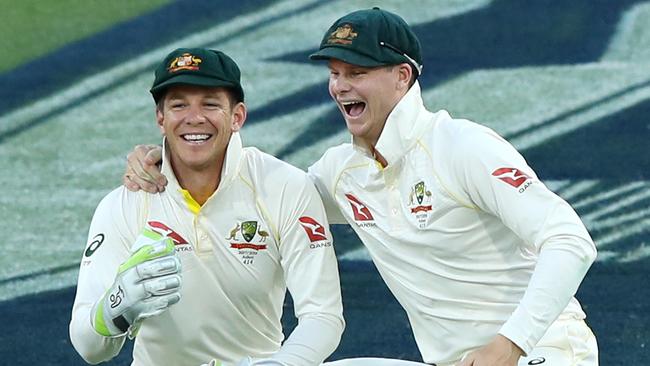 Tim Paine and Steve Smith during the first Ashes Test at the Gabba in 2017. Picture: Getty Images