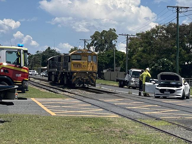 A train and car collide at the intersection of Cambridge and Denison Streets, Rockhampton, about 1pm.