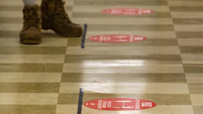 CA shopper is seen observing social distancing at an Australian supermarket. Picture: Jenny Evans/GETTY