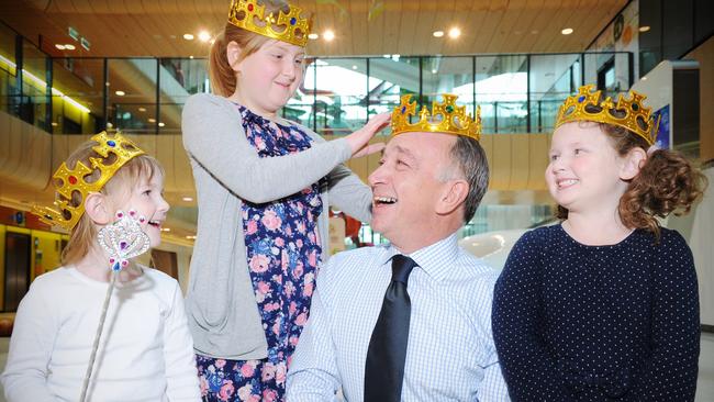 Tony Beddison at the Royal Children's Hospital, with Leah Davies, Alana McInerney and Scarlett McInerney.