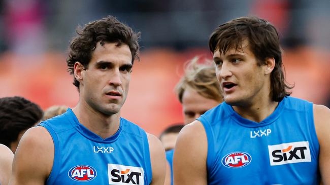 SYDNEY, AUSTRALIA - JULY 20: Ben King and Ned Moyle of the Suns look dejected after a loss during the 2024 AFL Round 19 match between the GWS GIANTS and the Gold Coast Suns at ENGIE Stadium on July 20, 2024 in Sydney, Australia. (Photo by Dylan Burns/AFL Photos via Getty Images)