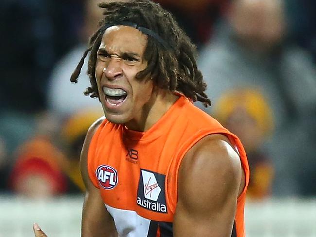 CANBERRA, AUSTRALIA - AUGUST 11:  Aiden Bonar of the Giants celebrates a goal during the round 21 AFL match between the Greater Western Giants and the Adelaide Crows at UNSW Canberra Oval on August 11, 2018 in Canberra, Australia.  (Photo by Mark Nolan/Getty Images)