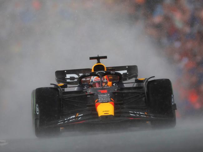 Max Verstappen’s RB19 powers through the rain to win the F1 Grand Prix of The Netherlands at Circuit Zandvoort. Picture: Lars Baron/Getty Images