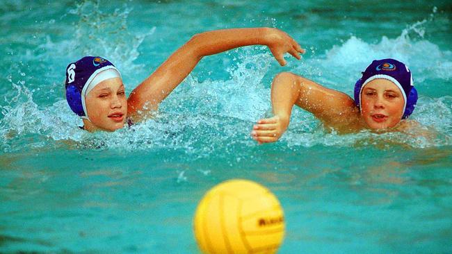 Mitchell Emery and Madeleine Smith at an under-14s water polo NSW challenge on February 21, 2003. Picture: Armen Deushian