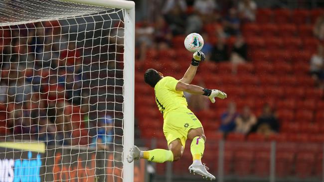 Brisbane goalkeeper Jamie Young pulls off a superb save against Newcastle Jets at McDonald Jones Stadium on Saturday. Picture: Getty Images