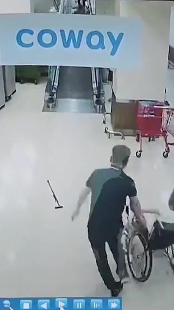 Quick-thinking man saves elderly woman hurtling down escalator