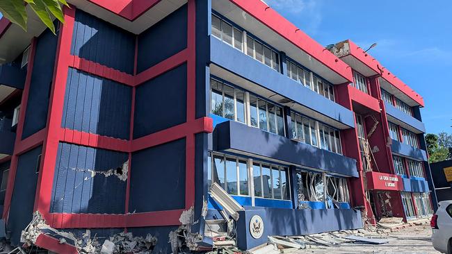 A general view of a severely damaged building housing the embassies of the United States, United Kingdom, and New Zealand after a powerful earthquake struck Port Vila. Picture: AFP