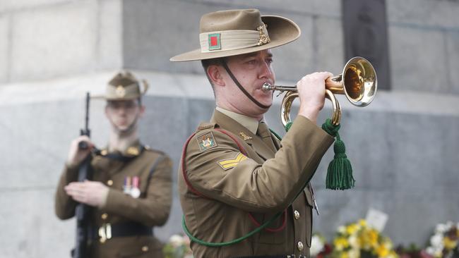 Corporal Curtis Willcox playing the bugle. Remembrance Day service in Hobart. Picture: Nikki Davis-Jones