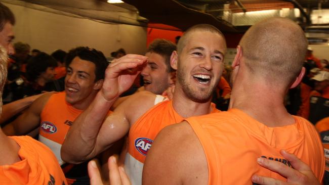 Callan Ward celebrates GWS Giants first AFL win in 2012.