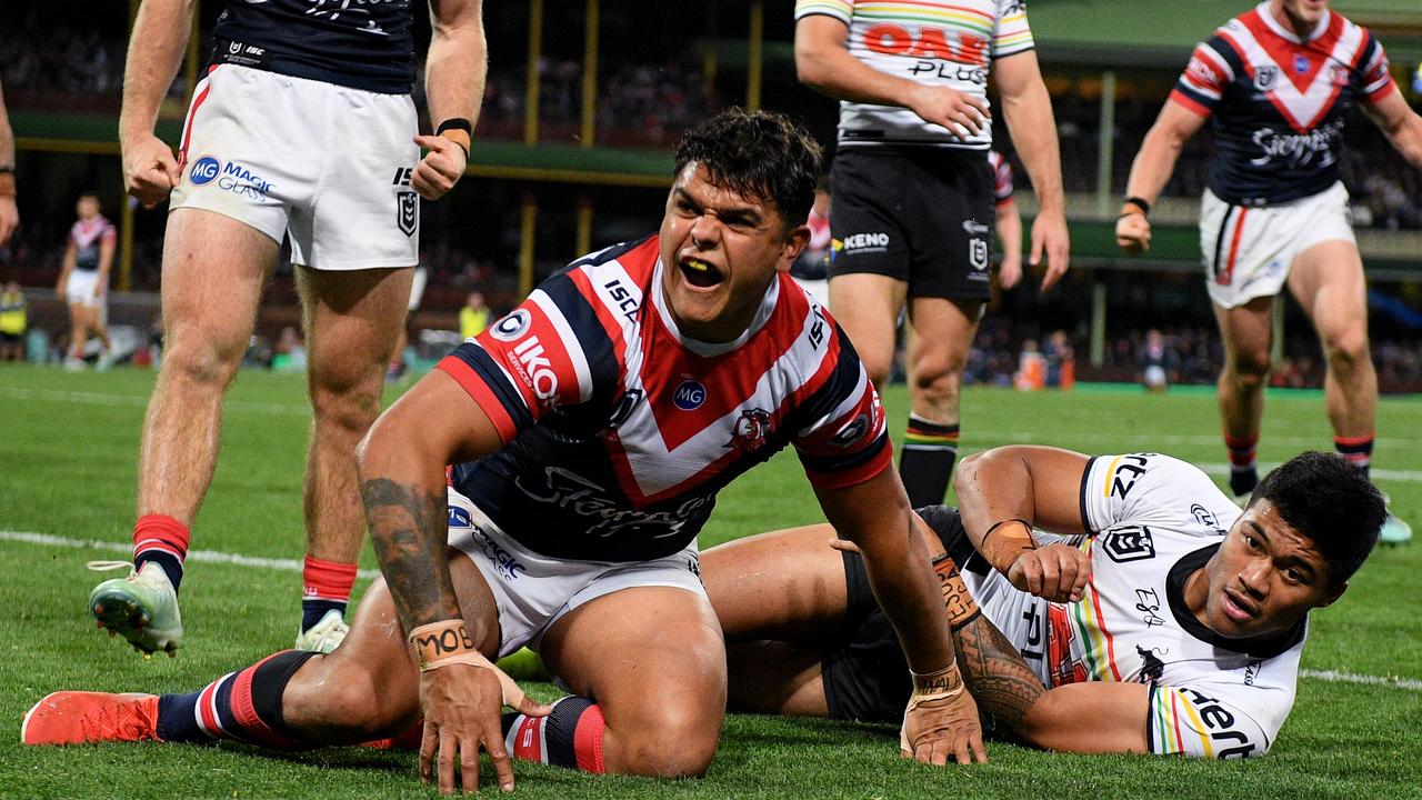 Latrell Mitchell scores a try for the Roosters. (AAP Image/Dan Himbrechts)