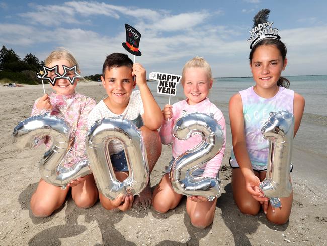 Cousins Lulu, Diesel, Gypsy and Avayda get ready for New Year’s Eve at Rye Beach on December 31, 2020. Picture: Michael Klein