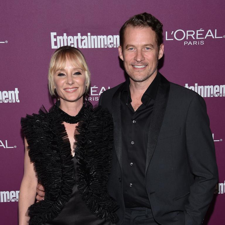 (FILES) In this file photo taken on September 15, 2017 James Tupper and Anne Heche attend the Entertainment Weekly 2017 pre-Emmy party at the Sunset Tower hotel in West Hollywood. - US actress Anne Heche has been hospitalized in critical condition after crashing her car into a Los Angeles home, US media reported Friday. The Los Angeles Fire Department reported that a vehicle struck a two-story house in Los Angeles' Mar Vista neighborhood, "causing structural compromise and erupting in heavy fire." (Photo by CHRIS DELMAS / AFP)