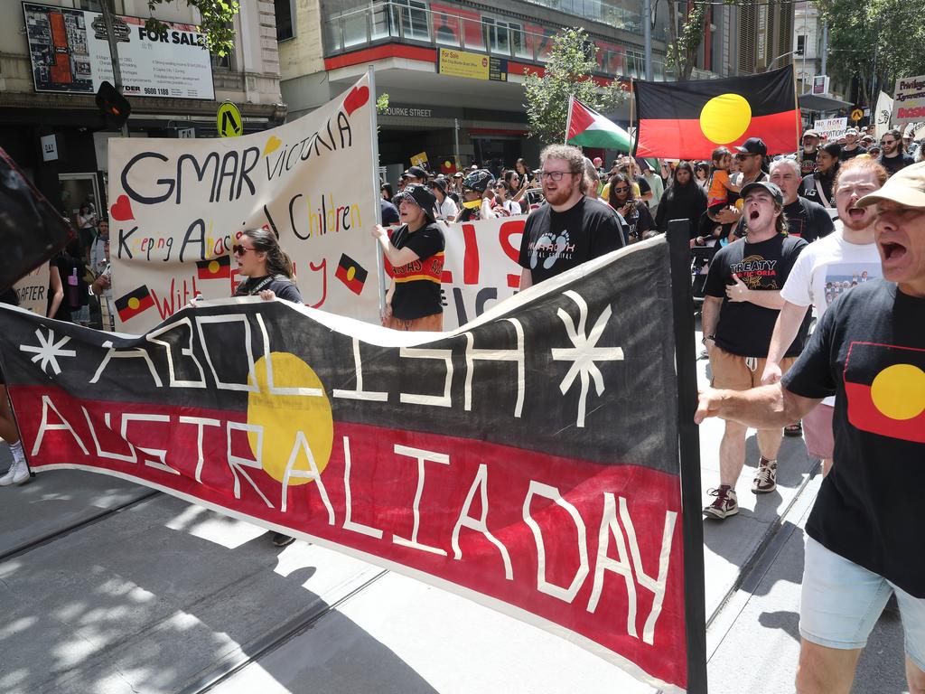 Tens of thousands of protesters march through the city streets. Picture: David Crosling