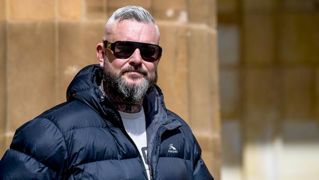 Scott Smith walks out of Adelaide Magistrates Court last September.