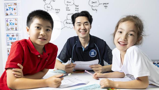 HOLDING FOR THE COURIER MAIL -  Tutor E-Yong Lee from Lee Excellence Education Academy with students Owen Gu and Emily Paterson, Saturday, January 4, 2025 - Picture: Richard Walker