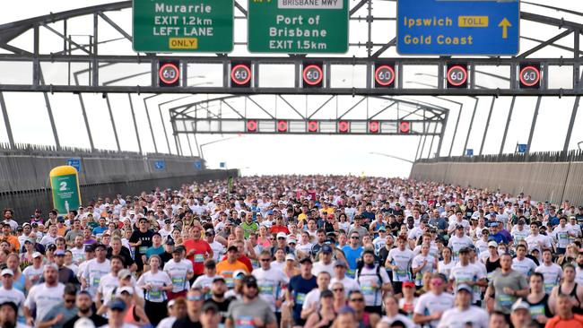 Runners and Walkers coming down the bridge for the Bridge 2 Brisbane fun run. Sunday August 28, 2022. Picture, John Gass