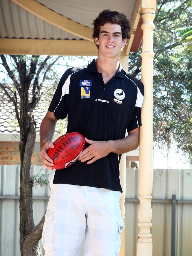 Footballer Scott Lycett, who is only 17 but already stands at 203cm, is set to make his SANFL debut for Port Adelaide Magpies this weekend. He is at his home in Ethelton, Adelaide.