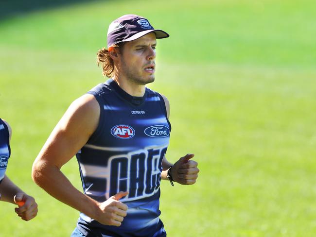 Jake Kolodjashnij pictured running laps at the Cats’ training. Picture: Alison Wynd