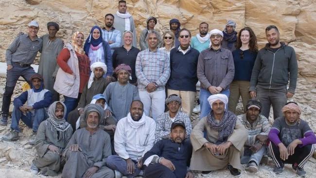 The team led by Piers Litherland (centre right with blue jumper and sunglasses) from the New Kingdom Research Foundation and Egypt's Antiquities Ministry that found the tomb.