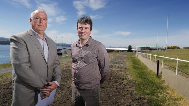 Garney Pearce and Ben Johnston, from the Hobart Northern Suburbs rail action group, on the section of rail line that has been removed to the Hobart Regatta Grounds. Picture: RICHARD JUPE