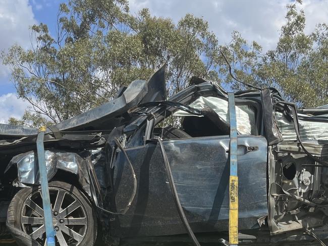 Police said the blue 2010 Holden Commodore ran off the highway about 10am and crashed into trees before overturning.