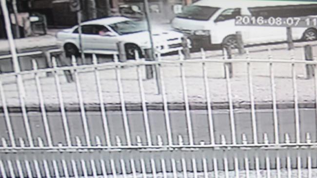 A still image captured on CCTV of the Mitsubishi colliding with a van.