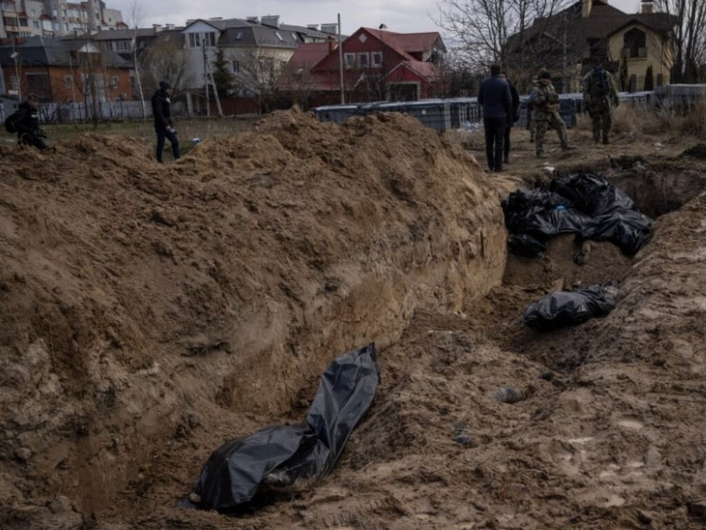 Disturbing images of civilians shot dead in one particular underground room were shared online