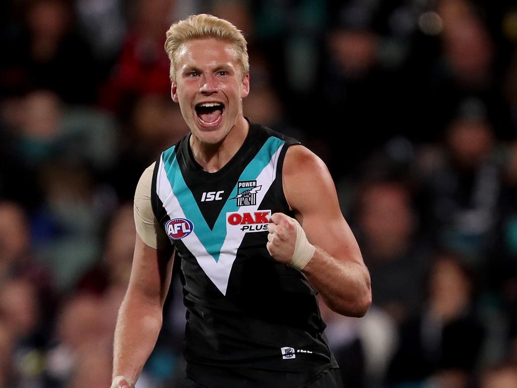 ADELAIDE, AUSTRALIA - AUGUST 24: Billy Frampton of the Power celebrates his first goal during the 2018 AFL round 23 match between the Port Adelaide Power and the Essendon Bombers at Adelaide Oval on August 24, 2018 in Adelaide, Australia. (Photo by James Elsby/AFL Media/Getty Images)