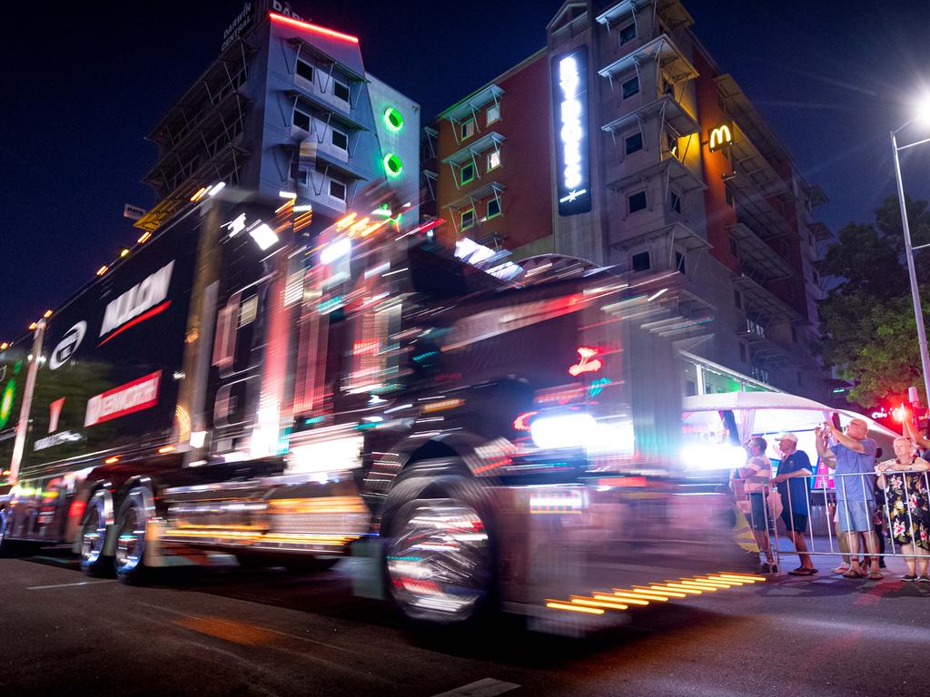 A convoy of trucks arrives in Darwin's CBD to announce the arrival of the Supercars for the round at Hidden Valley Raceway. Picture: Che Chorley