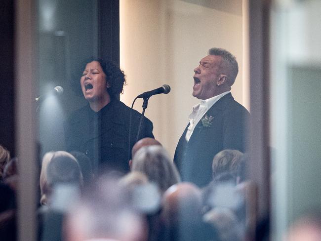 Jimmy and Mahalia Barnes sing Amazing Grace at the funeral. EXCLUSIVE PICTURE/ News Corp/Julian Andrews