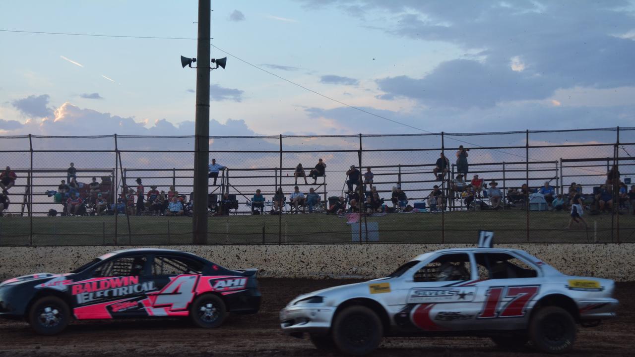 Aaron Alcock tries to overtake Darren Baldwin during the Kingaroy Speedway modified sedan heats on Saturday, November 16. (Photo: Jessica McGrath/ South Burnett Times)