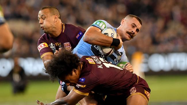 Reagan Campbell-Gillard of the Blues is tackled by Felise Kaufusi and William CHAMBERS of the Maroons during Game 1 of the 2018 State of Origin series at the MCG in Melbourne, Wednesday, June 6, 2018. (AAP Image/Joe Castro) NO ARCHIVING, EDITORIAL USE ONLY