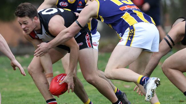 EDFL: West Coburg’s Perry Patrikios wins the ball. Picture: Hamish Blair